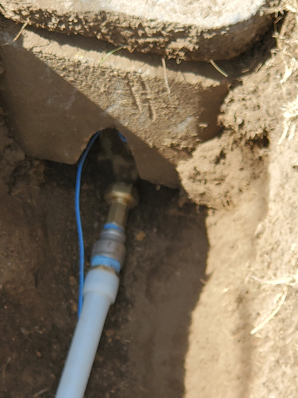 Replacing failed main water supply with new pipe and tracer wire.