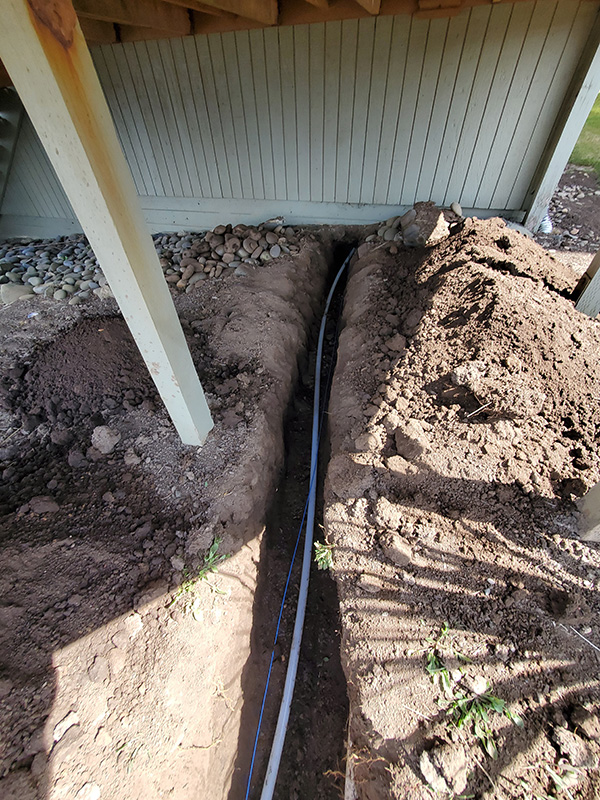 Replacing failed main water supply with new pipe and tracer wire.